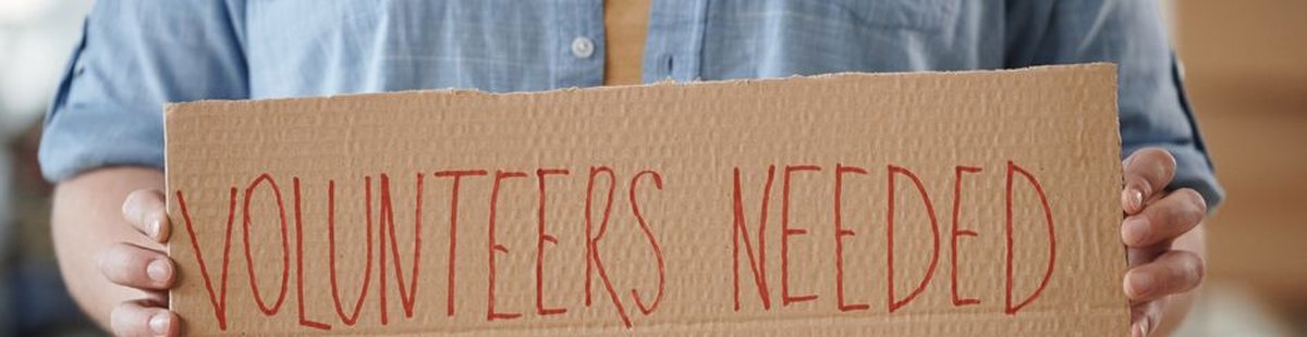 person volunteering helping community